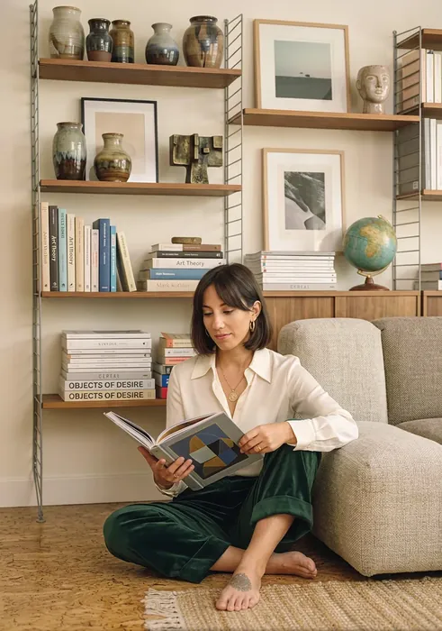 Woman reading in cozy room